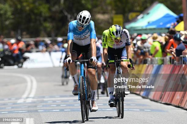 Clement Berthet of France and Decathlon AG2R La Mondiale Team and Georg Zimmermann of Germany and Team Intermarche - Wanty cross the finish line...