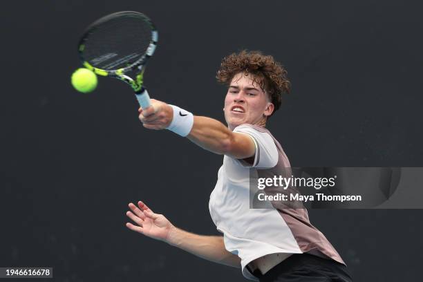 Viktor Frydrych of Great Britain plays a forehand in their round one junior boys singles match against Luis Jose Nakamine of Peru during the 2024...