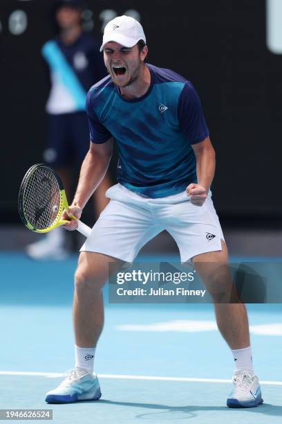 Miomir Kecmanovic of Serbia celebrates match point in their round three singles match against Tommy Paul of the United States during the 2024...