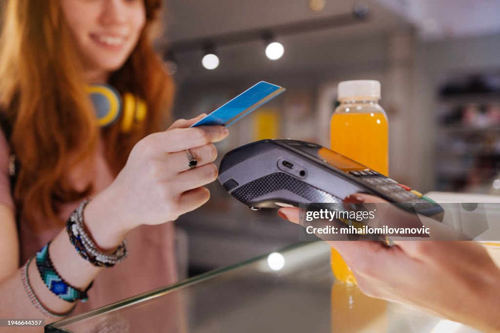 Close up of contactless payment with a credit card