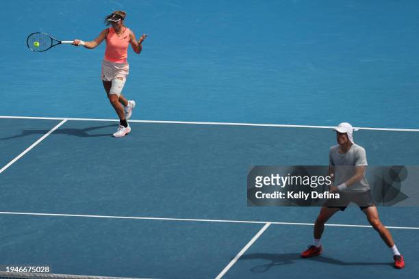 Olivia Gadecki of Australia and Marc Polmans of Australia compete in their round one mixed doubles match against Hao-Ching Chan of Chinese Taipei and...