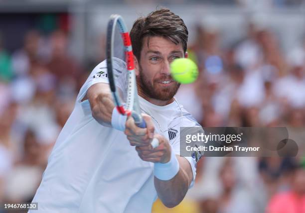 Cameron Norrie of Great Britain plays a backhand in their round three singles match against Casper Ruud of Norway during the 2024 Australian Open at...