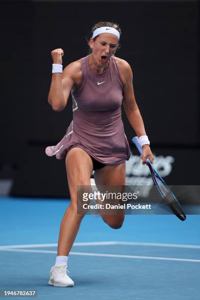 Victoria Azarenka celebrates a point in their round three singles match against Jelena Ostapenko of Latvia during the 2024 Australian Open at...