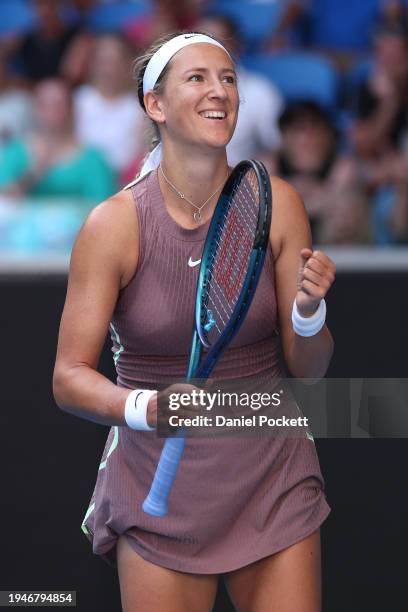 Victoria Azarenka celebrates match point in their round three singles match against Jelena Ostapenko of Latvia during the 2024 Australian Open at...