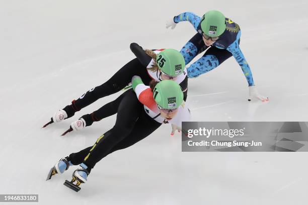 Diana Laura Vegi of Hungary, Anna Falkowska of Poland and Polina Omelchuk of Kazakhstan compete in the Women 1500m Quarterfinals during a day one of...