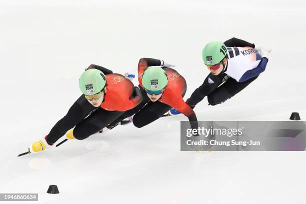 Kang Minji of South Korea, Li Jinzi of China and Yang Jingru of China compete in the Women 1500m Quarterfinals during a day one of the Winter Youth...