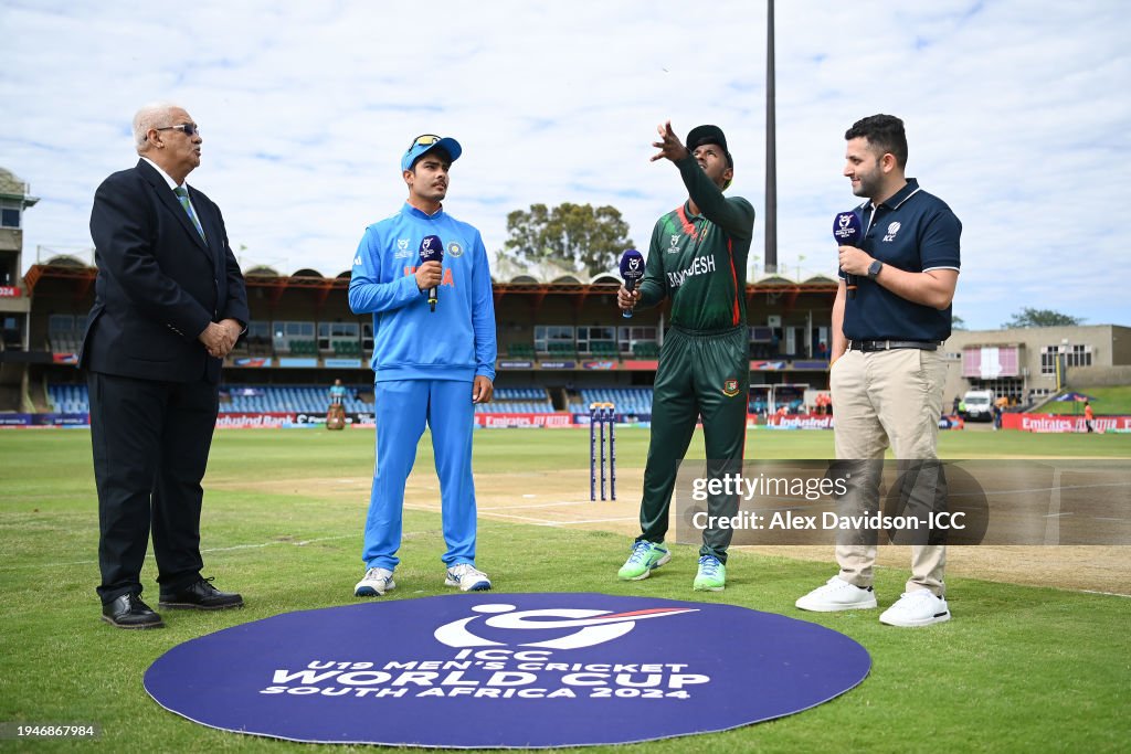 Snk Rahan Rabby Uday Saharan of India looks on as Mahfuzur Rahman Rabby of Bangladesh ...