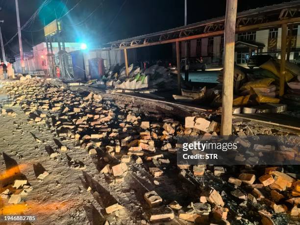 The rubble of houses damaged by a magnitude 7.1 earthquake is seen on a street in Wushi County, Aksu prefecture, in China's northwestern Xinjiang...