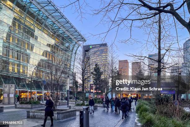 amsterdam financial district with in this photo the amsterdam south train and metro station. - amsterdam zuidas stock pictures, royalty-free photos & images