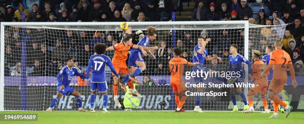 Leicester City's goalkeeper Mads Hermansen and Wout Faes battle with Ipswich Town's George Edmundson during the Sky Bet Championship match between...