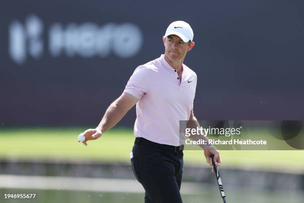 Rory McIlroy of Northern Ireland acknowledges the crowd after a birdie putt on the ninth green during Round Three of the Hero Dubai Desert Classic at...