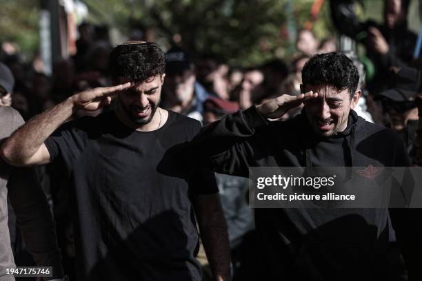 January 2024, Israel, Tel Aviv: Israelis mourn during the funeral of Israeli soldier Major Ilay Levy who was killed when two buildings collapsed...