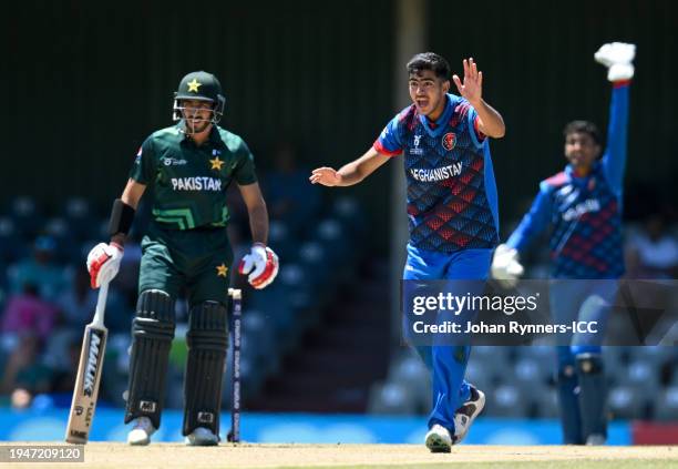 Bashir Ahmad of Afghanistan celebrates after taking the wicket of Arfat Minhas of Pakistan during the ICC U19 Men's Cricket World Cup South Africa...