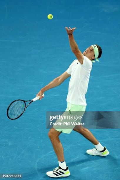 Alexander Zverev of Germany serves in their round three singles match against Alex Michelsen of the United States during the 2024 Australian Open at...