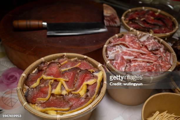 beef jerky slices in bamboo tray - beef jerky stock pictures, royalty-free photos & images
