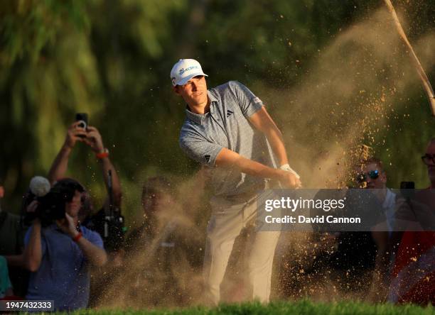 Rasmus Hojgaard of Denmark plays his second shot on the 18th hole during the third round of the Hero Dubai Desert Classic on The Majlis Course at The...