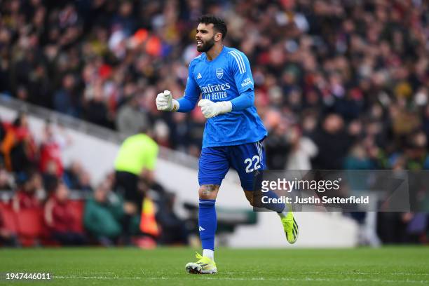 David Raya of Arsenal celebrates after teammate Leandro Trossard scores the team's third goal during the Premier League match between Arsenal FC and...
