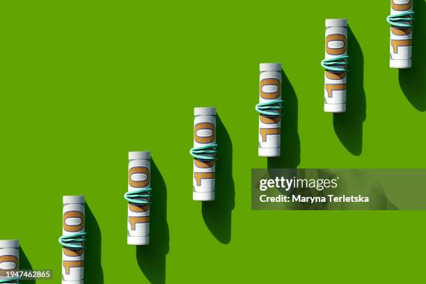 dollars on a green background. money. currency. inflation. world crisis. pattern of dollar bills. 100 dollars. financial minimalism. exchange market. money background. - company president stock pictures, royalty-free photos & images