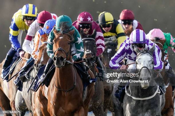 Runners make their way down the side of the track during The Boost Your Acca-Fenwa With BetUK Handicap at Lingfield Park Racecourse on January 20,...