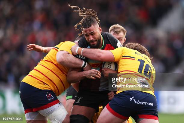 Chandler Cunningham-South of Harlequins is tackled during the Investec Champions Cup match between Harlequins and Ulster Rugby at Twickenham Stoop on...