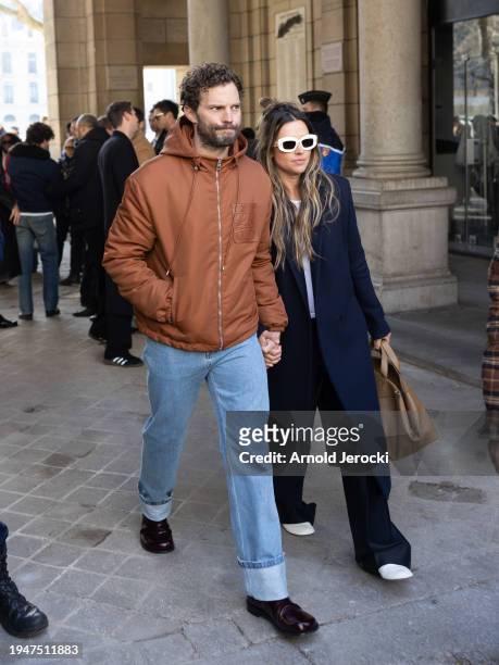 Jamie Dornan and Amelia Warner attends the Loewe Menswear Fall/Winter 2024-2025 show as part of Paris Fashion Week on January 20, 2024 in Paris,...