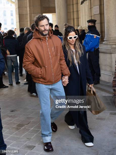 Jamie Dornan and Amelia Warner attends the Loewe Menswear Fall/Winter 2024-2025 show as part of Paris Fashion Week on January 20, 2024 in Paris,...