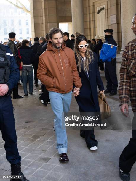 Jamie Dornan and Amelia Warner attends the Loewe Menswear Fall/Winter 2024-2025 show as part of Paris Fashion Week on January 20, 2024 in Paris,...