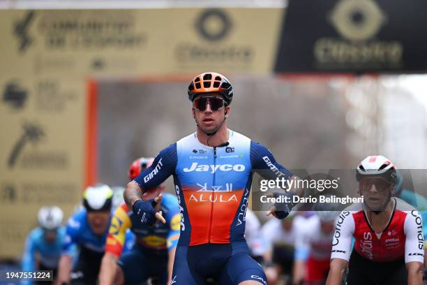 Dylan Groenewegen of The Netherlands and Team Jayco AlUla celebrates at finish line as race winner ahead of Tim Torn Teutenberg of Germany and Team...