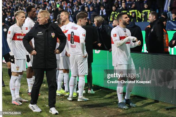 The team of Stuttgart speaks to the fans during the break of the Bundesliga match between VfL Bochum 1848 and VfB Stuttgart at Vonovia Ruhrstadion on...