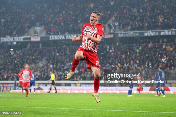 Roland Sallai of Sport-Club Freiburg celebrates scoring his team's third goal during the Bundesliga match between Sport-Club Freiburg and TSG...
