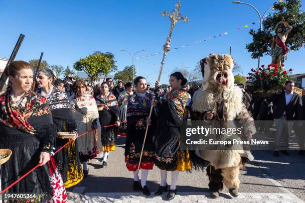 Several people during the festival of Las Carantoñas de Acehuche, on 20 January, 2024 in Acehuche, Caceres, Extremadura, Spain. In 2020 the festival...