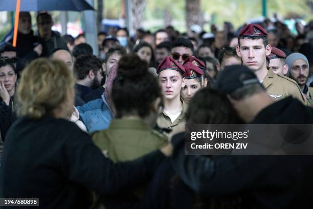 Fellow soldiers mourn during the funeral of Israeli soldier Ilay Levy at the military cemetery in Tel Aviv, on January 23 after he was killed in...