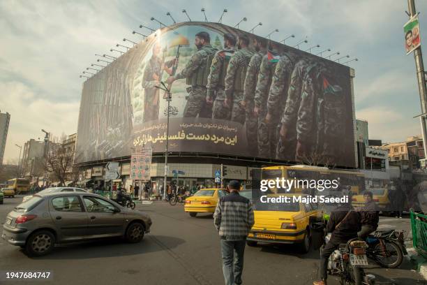 Huge billboard on Enghelab square, depicting Q Soleimani delivering weapons to Hamas. With the text: this man filled palestinians pockets. On January...
