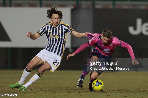 Martin Palumbo of Juventus tugs on the jersey of Federico Marchesi of Rimini FC during the Serie C match between Juventus Next Gen and Rimini at...