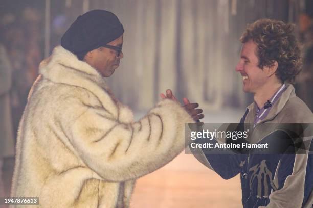 Ronaldinho and designer Colm Dillane walk the runway during the KidSuper Menswear Fall/Winter 2024-2025 show as part of Paris Fashion Week on January...