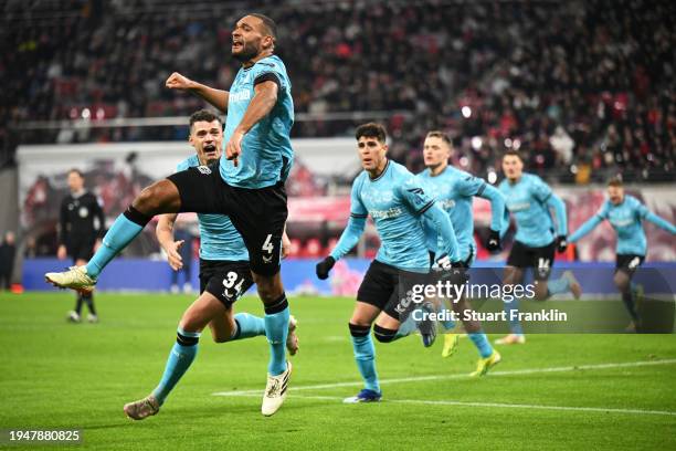 Jonathan Tah of Bayer Leverkusen celebrates scoring his team's second goal with teammates during the Bundesliga match between RB Leipzig and Bayer 04...