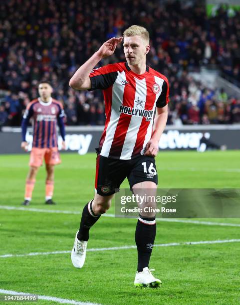 Ben Mee of Brentford celebrates scoring his team's second goal during the Premier League match between Brentford FC and Nottingham Forest at Gtech...