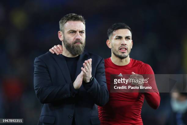 Daniele De Rossi, Head Coach of AS Roma, and Leandro Paredes acknowledges the fans following the Serie A TIM match between AS Roma and Hellas Verona...