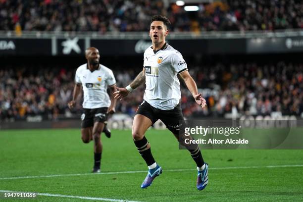 Hugo Duro of Valencia CF celebrates scoring his team's first goal during the LaLiga EA Sports match between Valencia CF and Athletic Bilbao at...