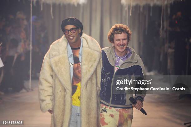 Ronaldinho and Designer Colm Dillane walk the runway during the Kidsuper Menswear Fall/Winter 2024-2025 show as part of Paris Fashion Week on January...
