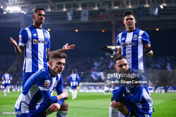 Evanilson of FC Porto celebrates with Wenderson Galeno of FC Porto, Francisco Conceicao of FC Porto and Pepe of FC Porto after scoring his team's...