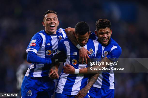 Wenderson Galeno of FC Porto celebrates with Evanilson of FC Porto and Pepe of FC Porto after scoring his team's third goal during the Liga Portugal...