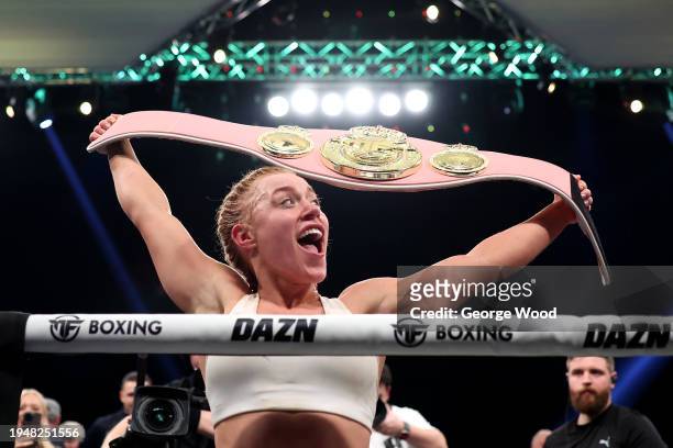 Elle Brooke celebrates with her belt after victory in the Misfits Boxing Female Middleweight title fight between Andrea Jane Bunker and Elle Brooke...