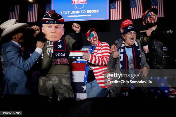 Supporters of Republican presidential candidate, former U.S. President Donald Trump attend a campaign rally at the SNHU Arena on January 20, 2024 in...