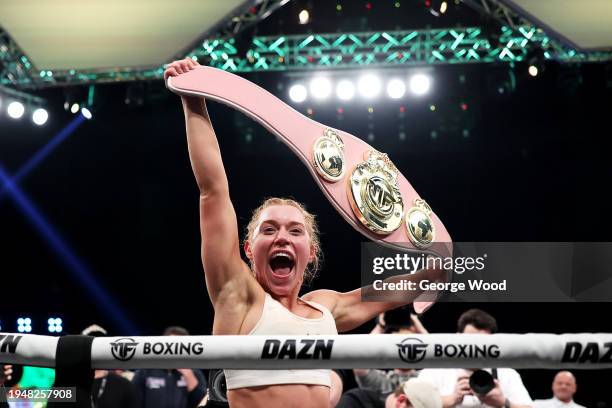 Elle Brooke celebrates with her belt after victory in the Misfits Boxing Female Middleweight title fight between Andrea Jane Bunker and Elle Brooke...