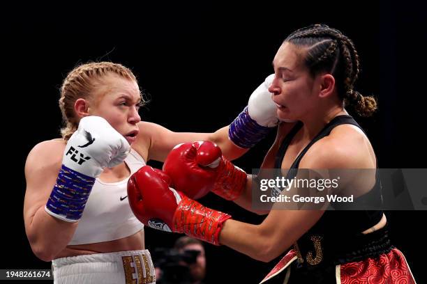 Elle Brooke and Andrea Jane Bunker exchange punches during the Misfits Boxing Female Middleweight title fight between Andrea Jane Bunker and Elle...