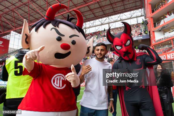 Alexis Vega of Toluca poses with mascot prior the 2nd round match between Toluca and Mazatlan FC as part of the Torneo Clausura 2024 Liga MX at...