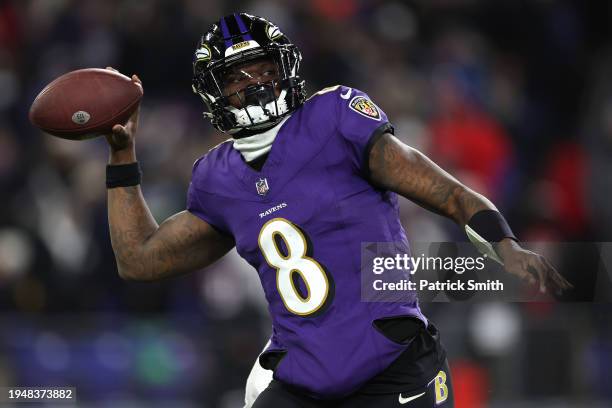 Lamar Jackson of the Baltimore Ravens throws a pass against the Houston Texans during the second quarter in the AFC Divisional Playoff game at M&T...