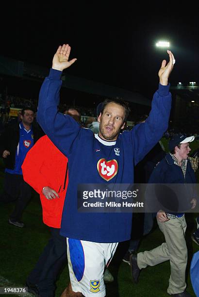 Portsmouth captain Paul Merson of Portsmouth celebrates his side winning promotion to the Premier League after the Nationwide League Division One...