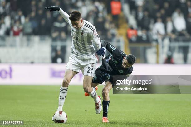 Ege Tiknaz of Besiktas in action against Emre Akbaba of Adana Demirspor during the Turkish Super Lig 22nd week match between Besiktas and Adana...